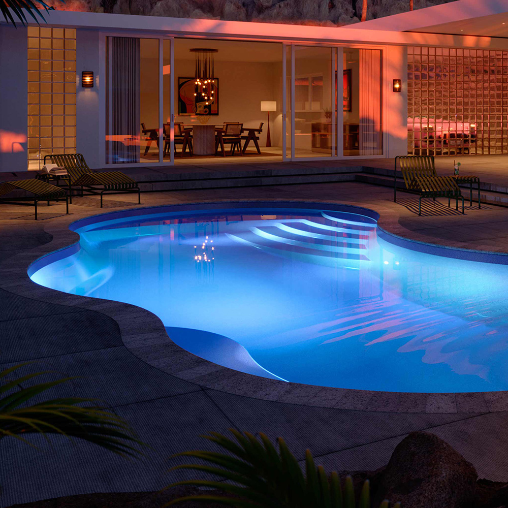 Latham Coral 16 organic freeform fiberglass pool with tanning ledge