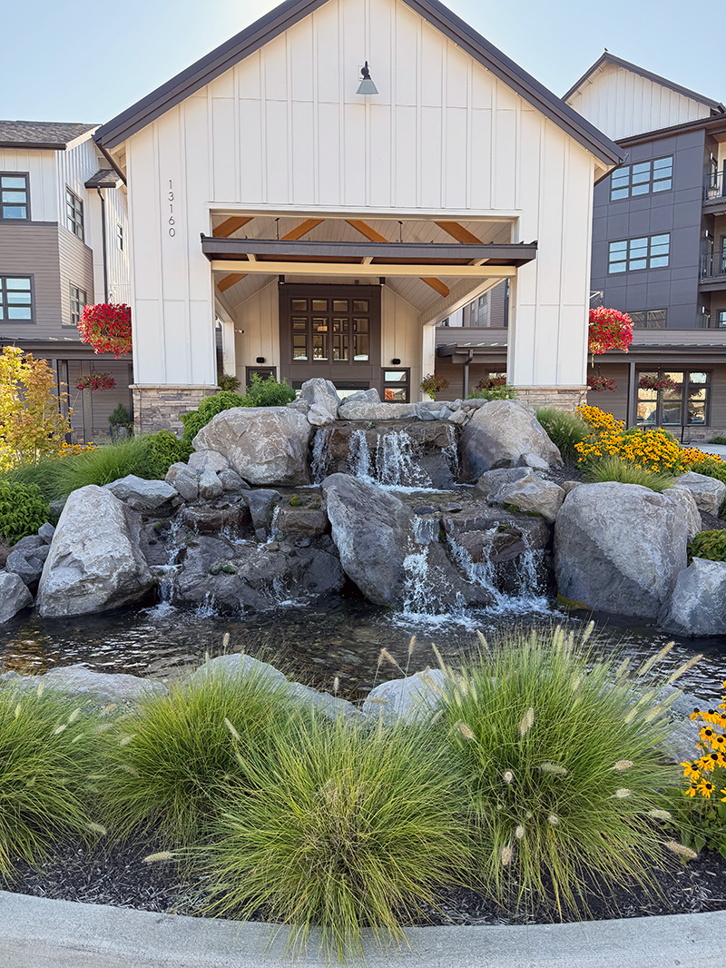 a commercial water feature waterfall from Water's Edge Pools & Spas