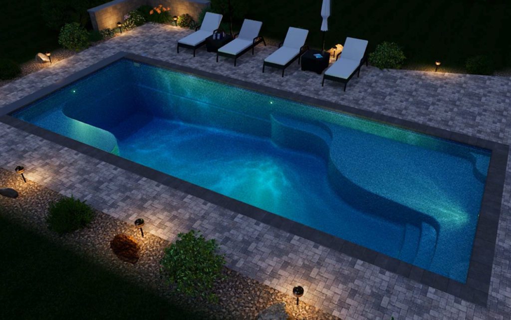 Outside pool at dusk by Water's Edge Pools & Spas